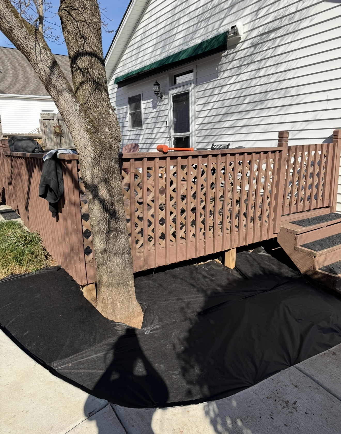Landscape Fabric and Rock Install — before